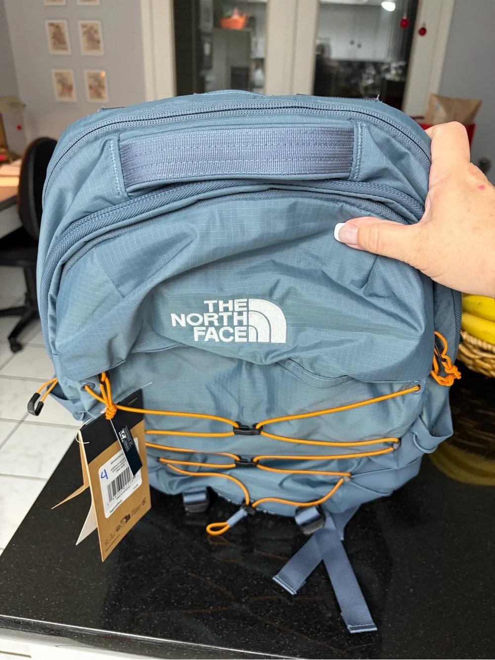 The North Face Borealis Backpack in Granite Grey with Orange Cords